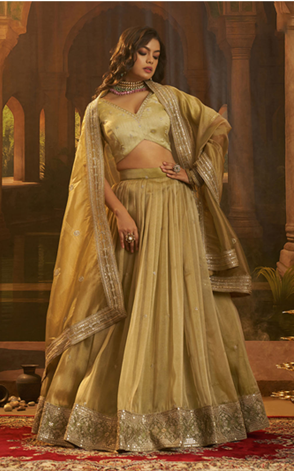 Woman in a traditional outfit with a rich, detailed background