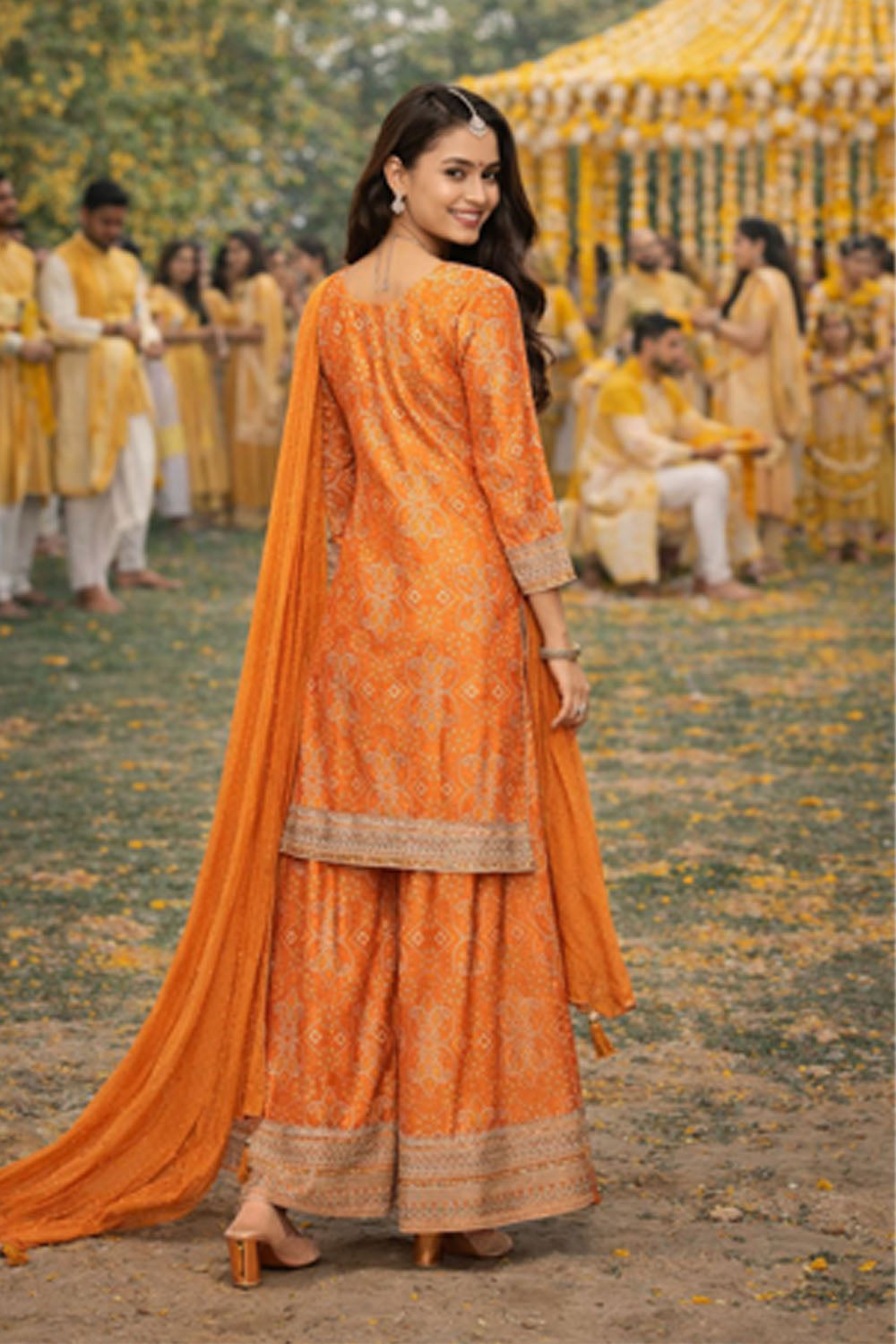 Woman in an orange traditional outfit with a festive background