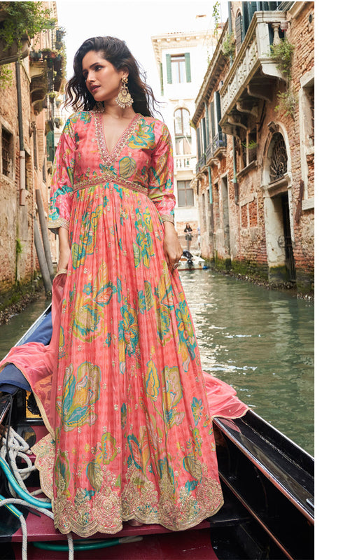 Woman in a floral dress on a gondola in Venice